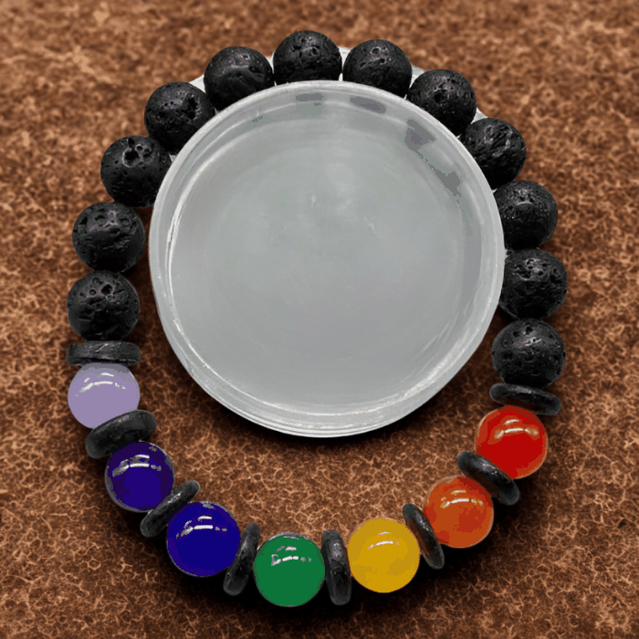 Vibrant Rainbow Gemstone Beaded Bracelet featuring colorful jade and lava rock beads on a brown background.