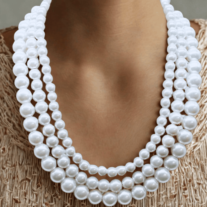 Classic 3 Strand White Pearl Necklace with sterling silver clasp.