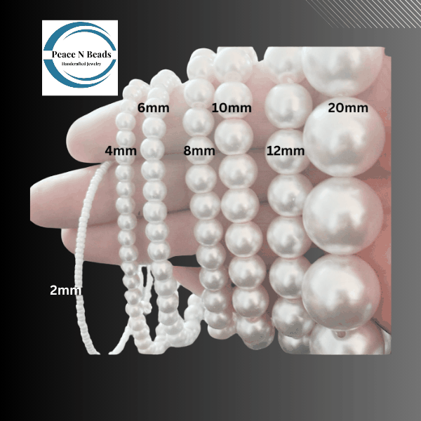 Blue Jade and White Glass Pearl Charm Bracelet with semiprecious gemstones, featuring royal blue jade, white pearls, and sparkling crystals for an elegant look.