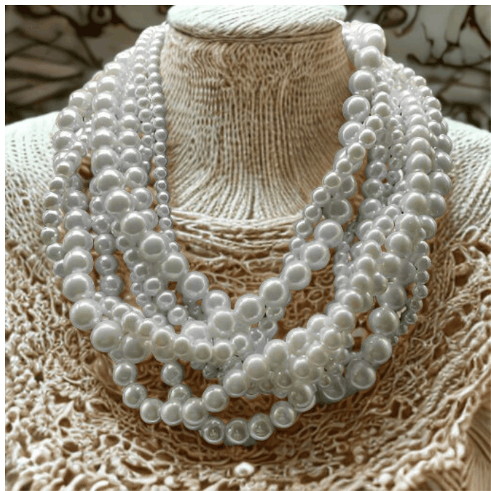 White Glass Pearl Multi Layer Strand Necklace with elegant white glass pearls on a display mannequin.