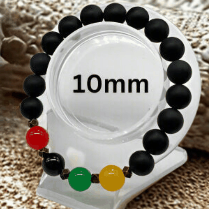Black Juneteenth Gemstone Bracelet with 10mm black beads and red green yellow accent beads by Peace N Beads