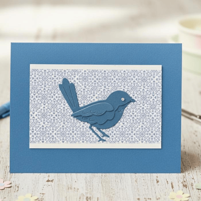 Doves in Flight Note Card Set featuring elegant blue dove design on patterned background