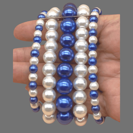 5 Strand Royal Blue and White Pearl Bracelet on hand.
