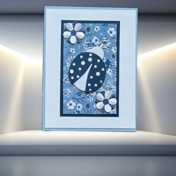 Peace N Beads Design note card featuring Garden Whispers Ladybugs and Blooms with blue floral background and ladybug accents