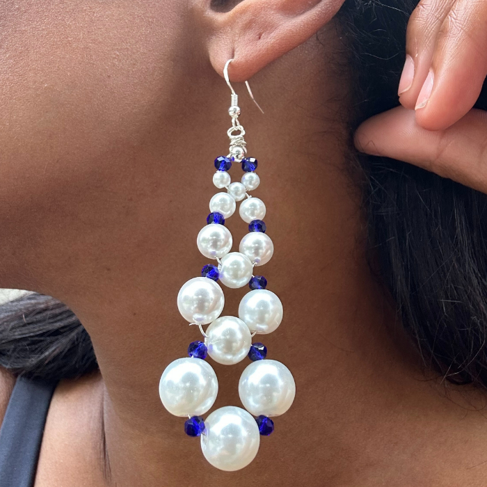 Peace N Beads elegant pearl and blue bead drop earrings worn on ear with silver hooks