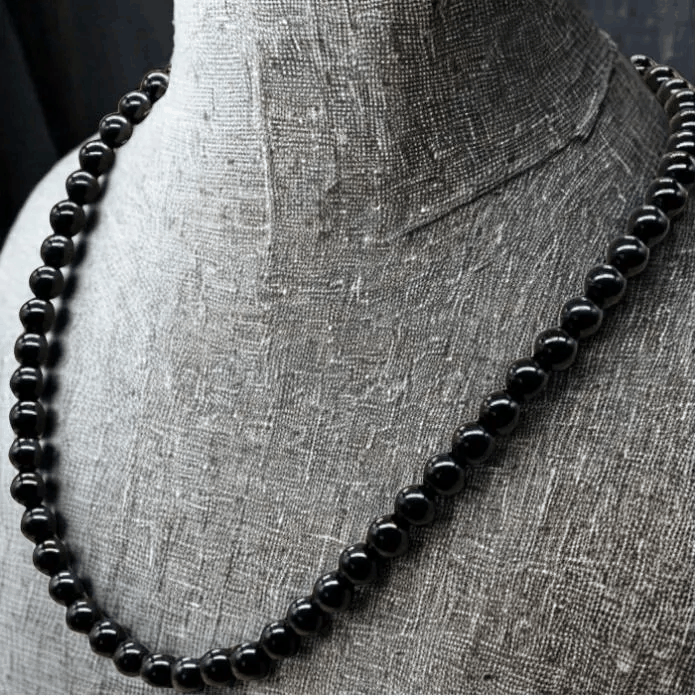 Peace N Beads Black Onyx Gemstone Necklace featuring smooth round black beads on display