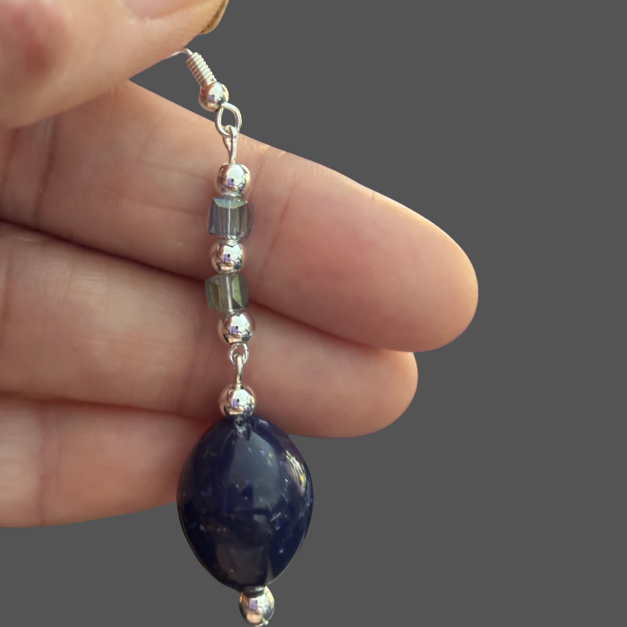 Blue Glass Crystal Drop Earrings by Peace N Beads Design held in hand showing detailed beadwork