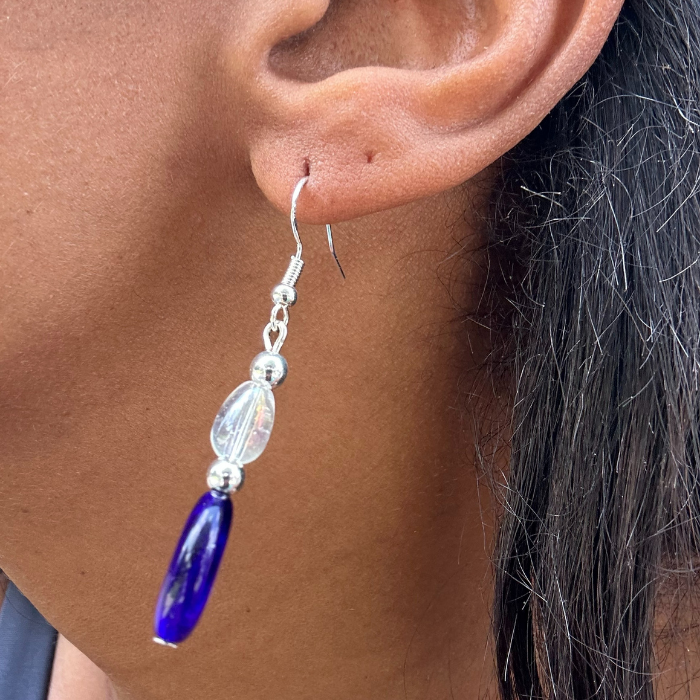 Elegant Blue Acrylic Earrings with Glass Crystals hanging from ear by Peace N Beads Design