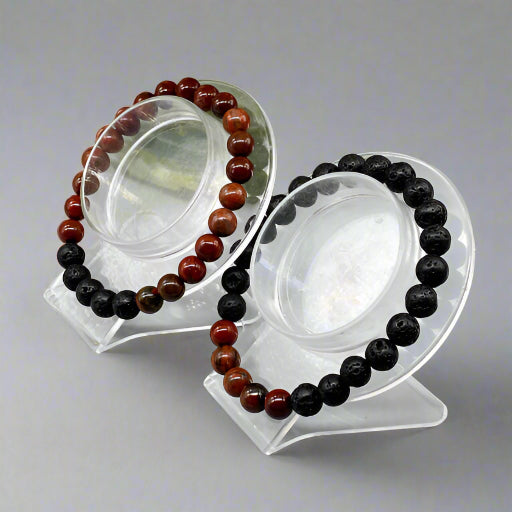 Energy Balancing Bracelets Root Chakra by Peace N Beads Design with red and black stone beads on display stands