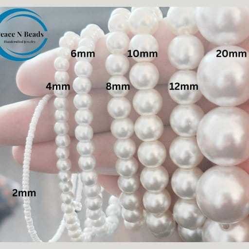 Variety of pearl bead sizes for crafting necklaces, showcasing options from 2mm to 20mm
