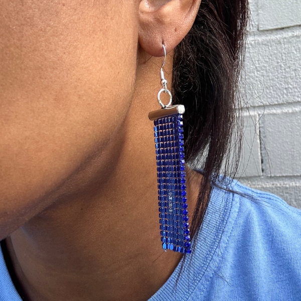 Peace N Beads Rhinestone Crystal Drop Earrings in blue worn on ear with silver hook