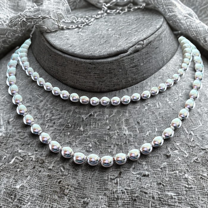 The Connection of Silver Hematite Necklace by Peace N Beads Design with two strands of shiny silver beads