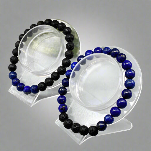 Peace N Beads Design Third Eye Chakra Bracelet set with black lava and blue beads displayed on clear stands