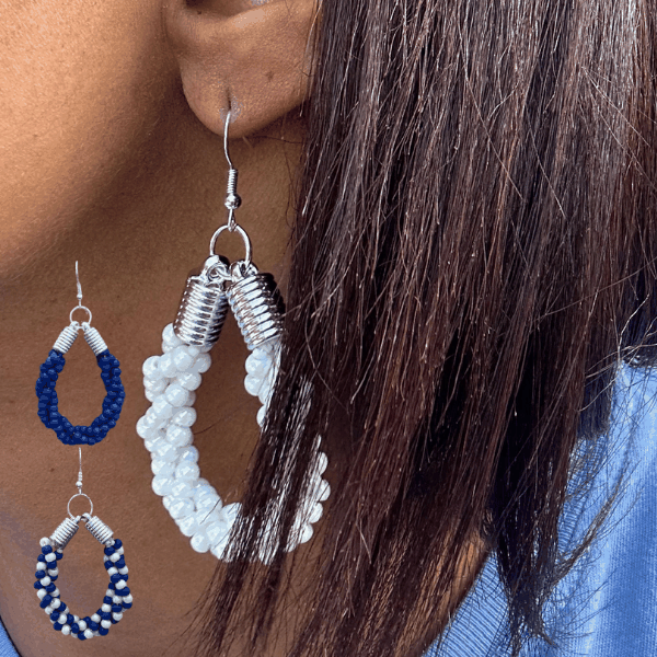 Peace N Beads Twisted Royal Blue and White Hoop Earrings worn on ear showcasing vibrant bead design