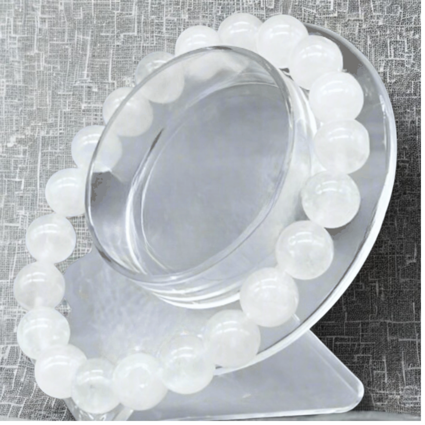 Premium White Jade Gemstone Bracelet by Peace N Beads displayed on clear round stand