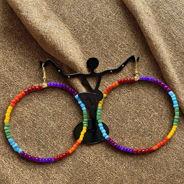 Vibrant Rainbow Hoop Earrings by Peace N Beads with multicolored beads in circular design