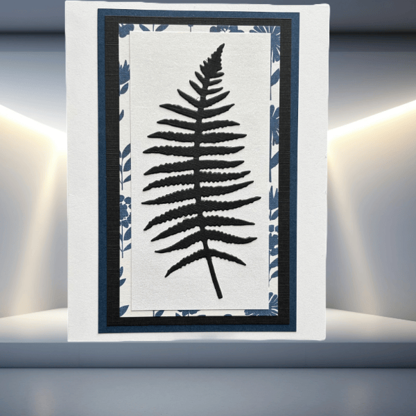 Whispers of the Wild Nature's Leaf Collection Note Cards featuring a black fern leaf design on layered blue and white backgrounds