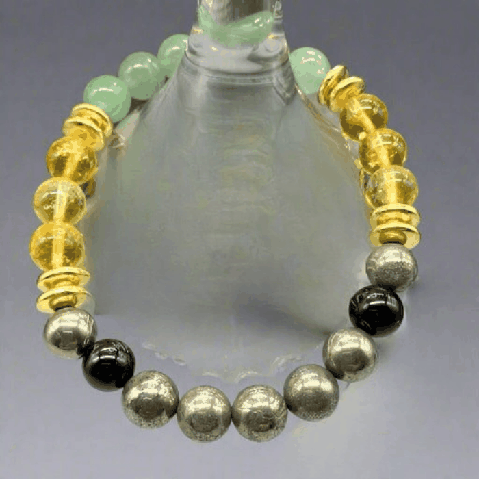 Manifest Gemstone Bracelet with Pyrite, Citrine, Aventurine, Obsidian, and Hematite stones for manifestation and positive energy.