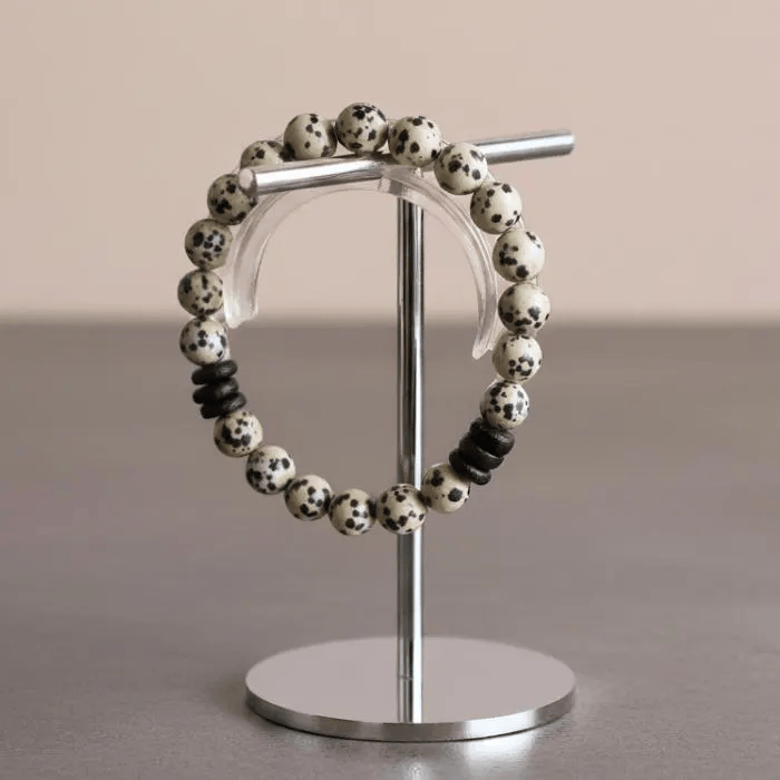 Dalmatian Gemstone Bracelet featuring spotted beads and black accents, ideal for stylish layering