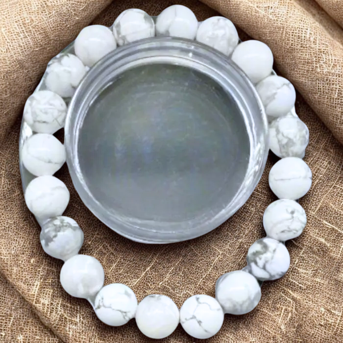 Serene Howlite Gemstone Bracelet Featured with Elegant White Beads on Natural Fabric Background