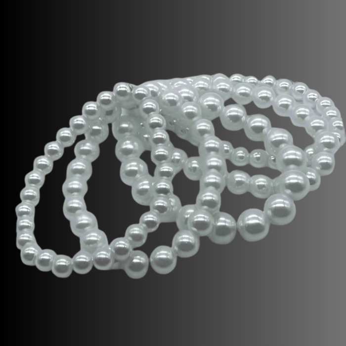 Multi strand white glass pearl stretch bracelet with five intertwined strands.