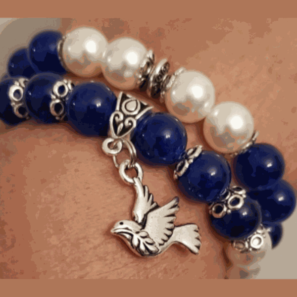 Royal Blue Jade and White Pearl Bracelet with Dove Charm handcrafted accessory.