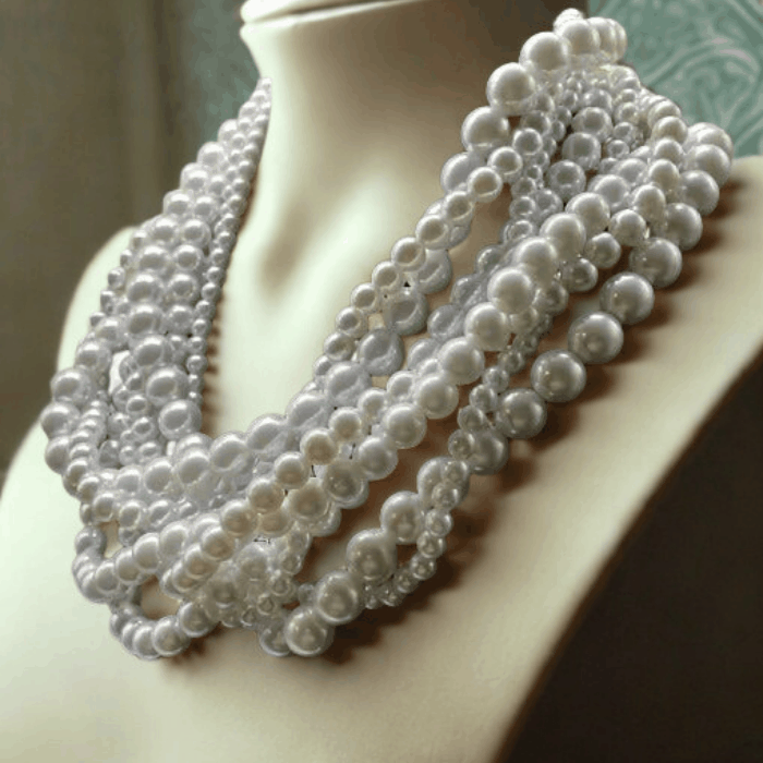 White Glass Pearl Multi Layer Strand Necklace displayed on mannequin.