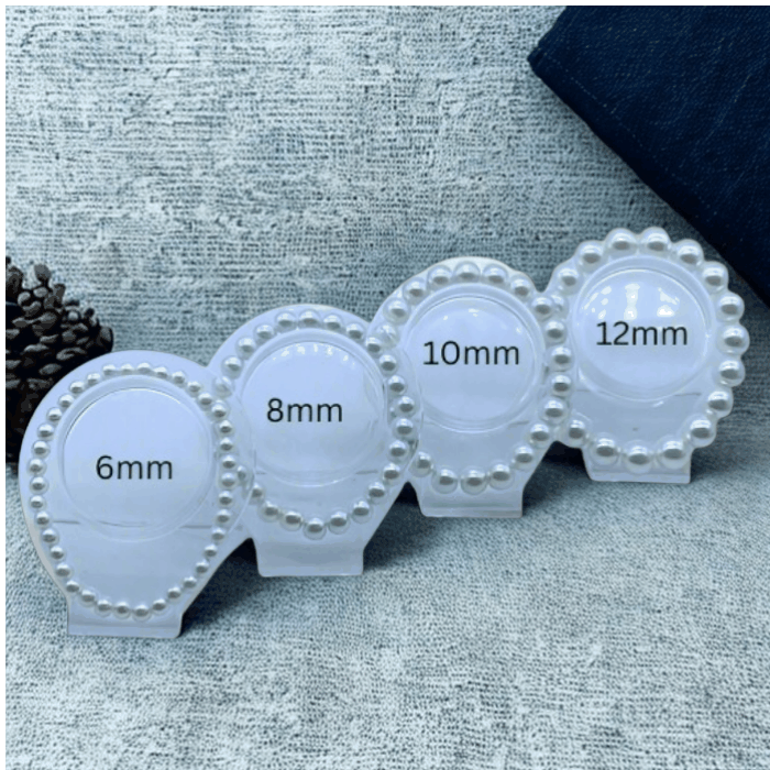 White Glass Pearl Stretch Bracelet with size options 6mm, 8mm, 10mm, 12mm pearls on a textured backdrop.