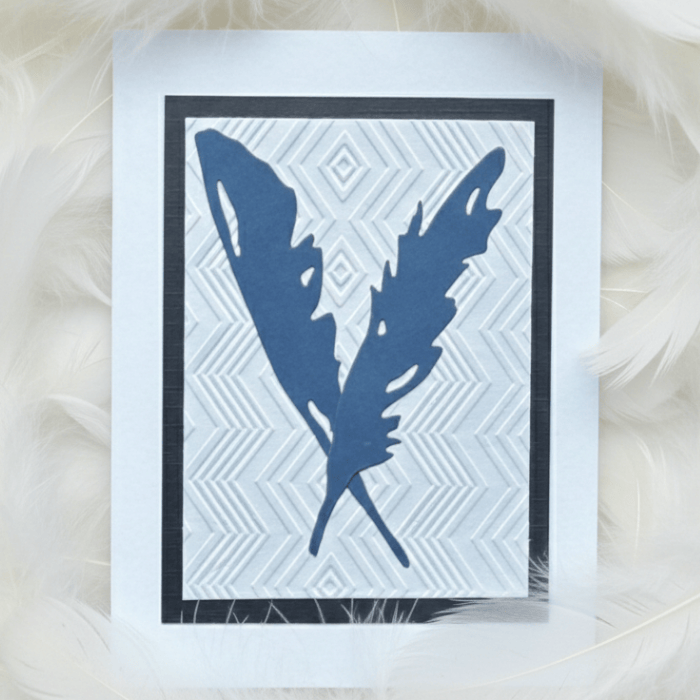 Handcrafted note card featuring a blue feather design titled A Flutter of Fun for special occasions