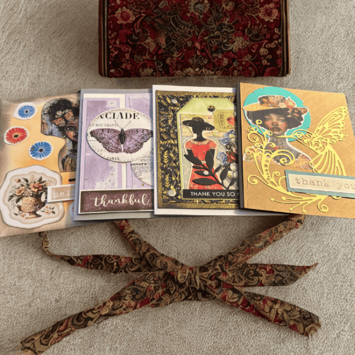 A Touch of Nostalgia note cards set featuring artistic designs and decorative ribbons for heartfelt messages.