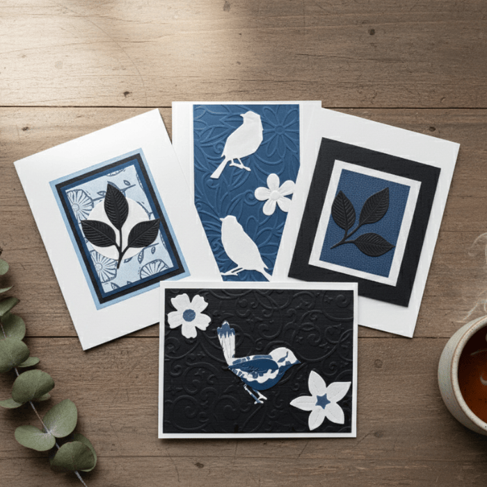 Set of Blossoms of Affection Note Cards featuring birds and floral designs in blue and black