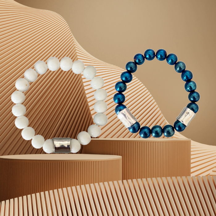 Blue Hematite and White Jade Double Bracelets by Peace N Beads Design on textured neutral background