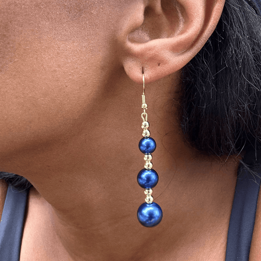 Elegant Hematite and Blue Glass Pearl Drop Earrings showcased on a model's ear