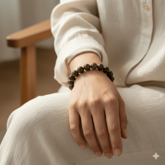 Genuine Brown Bronzite Gemstone Bracelet worn on wrist, showcasing its natural beauty and elegant design