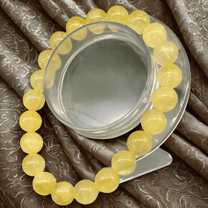Natural Citrine Gemstone Bracelet for Power and Abundance by Peace N Beads displayed on gray fabric