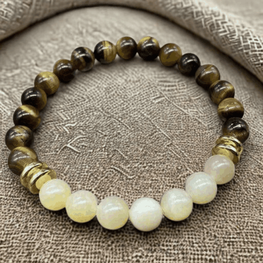 Empowerment Genuine Gemstone Bracelet by Peace N Beads Design featuring polished brown and white beads on elastic band
