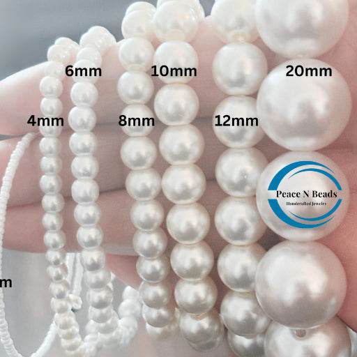 5 Strand Royal Blue and White Pearl Bracelet displayed with various pearl sizes for jewelry lovers