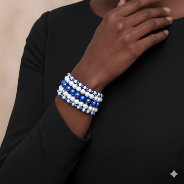 5-Strand Royal Blue and White Pearl Stretch Bracelet layered on a model's wrist with a black outfit