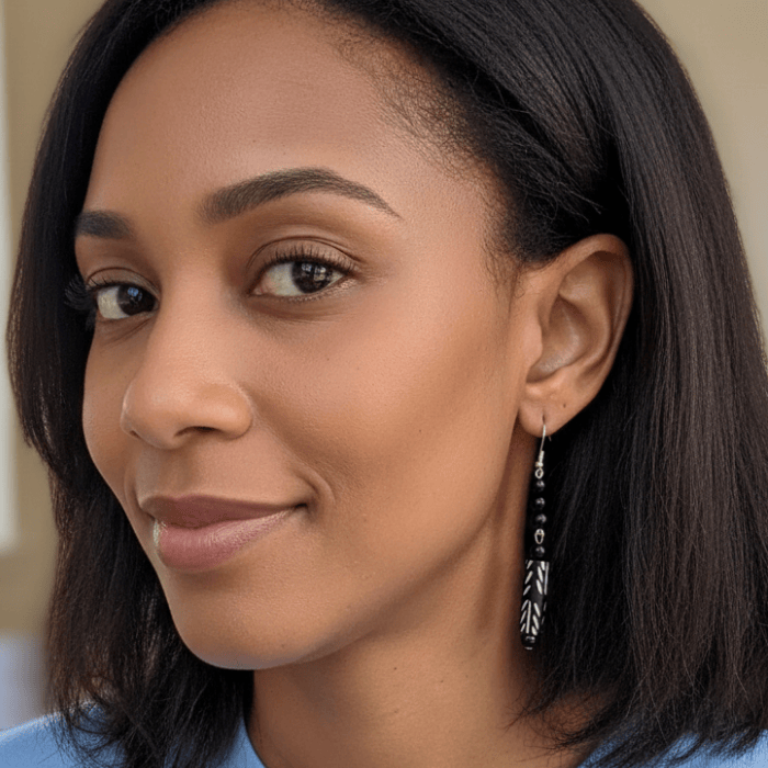 Black Onyx and Wood Drop Earrings showcased on a model, highlighting their elegant design