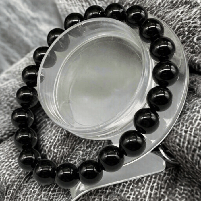 Peace N Beads Black Onyx Jewelry Set featuring a polished black beaded bracelet on a display stand