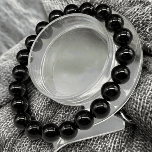 Peace N Beads Black Onyx Jewelry Set featuring a polished black beaded bracelet on a display stand