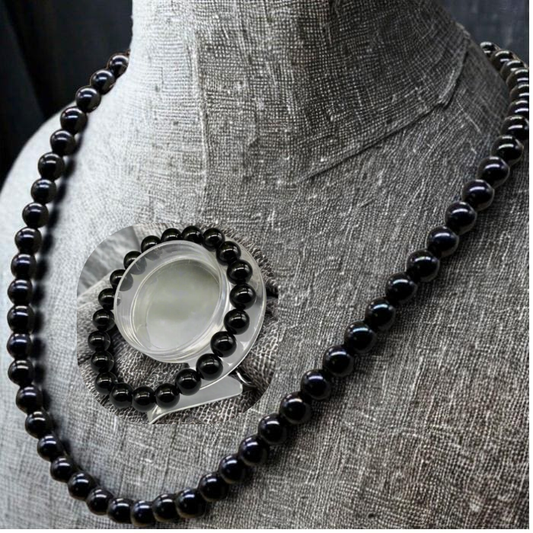 Black Onyx Jewelry Set featuring a necklace and matching bracelet on a display mannequin