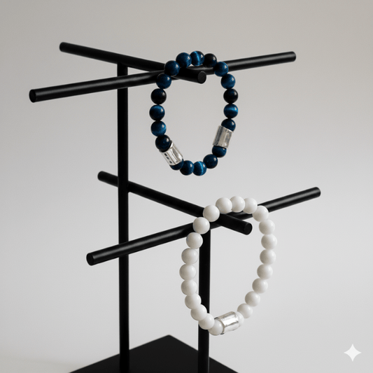Blue Tiger Eye and Jade Gemstone Bracelets displayed on a sleek black stand for elegant styling