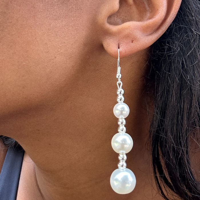 Elegant Hematite and Glass Pearl Drop Earrings worn on ear by Peace N Beads Design