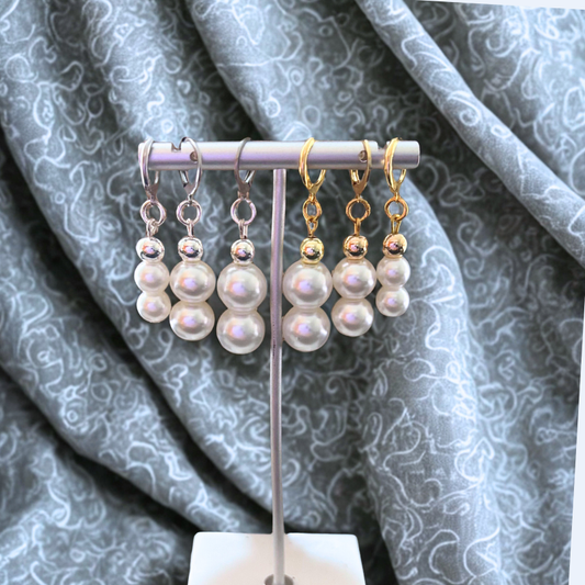 Peace N Beads Design Elegant Pearl 2 Drop Earrings in gold and silver tones displayed on gray fabric background