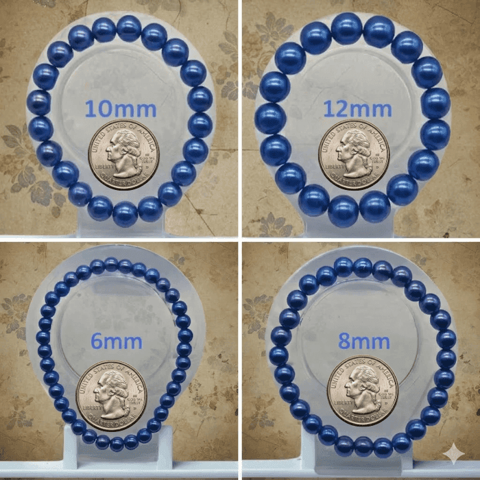 Elegant Single Strand Royal Blue Glass Pearl Stretch Bracelet displayed in various sizes with a coin for scale
