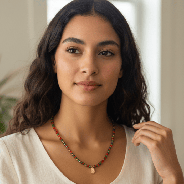 Model wearing a Festive Red and Green Seed Bead Necklace with a charming design for holiday celebrations