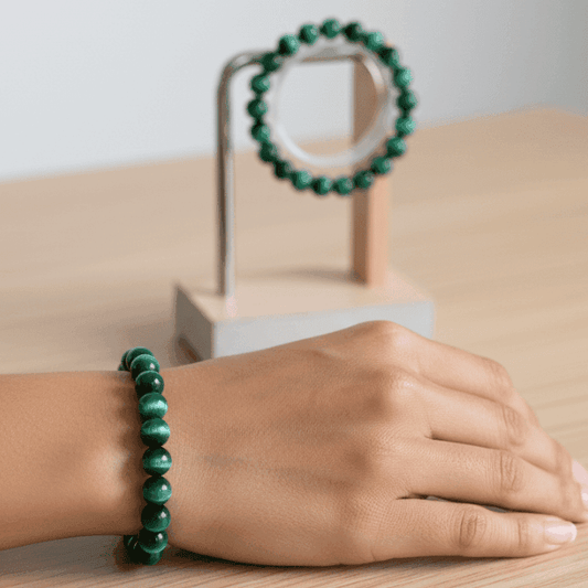 Genuine Green Tiger Eye Motivational Bracelet on a woman's wrist with a matching bracelet display