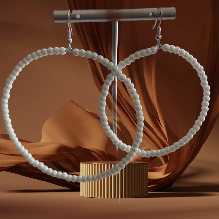 Glamorous Oversized Hoops Peace N Beads white beaded large hoop earrings hanging on display stand