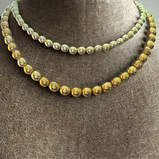 Gold Hematite Gemstone Necklace showcasing a double-layered design with shiny round beads